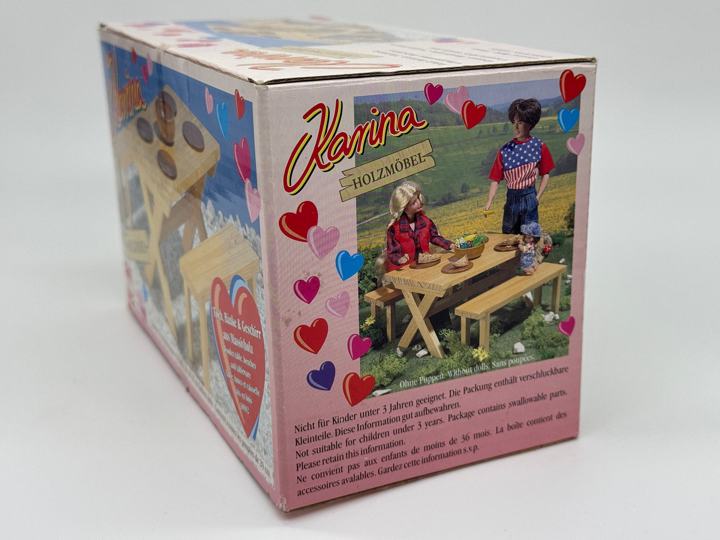 Karina "Outdoor Wooden Furniture #18982" Table, benches and tableware made of solid wood, Busch (2003)