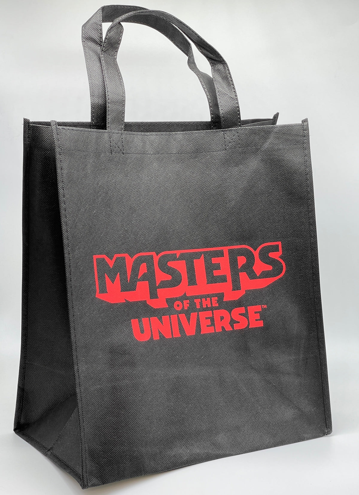 Sac de transport « Masters of the Universe » avec logo MOTU noir/rouge (Mattel)