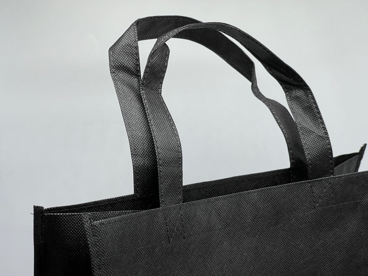 Sac de transport « Masters of the Universe » avec logo MOTU noir/rouge (Mattel)